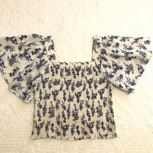 Beautiful crop top. Used. Excellent condition.